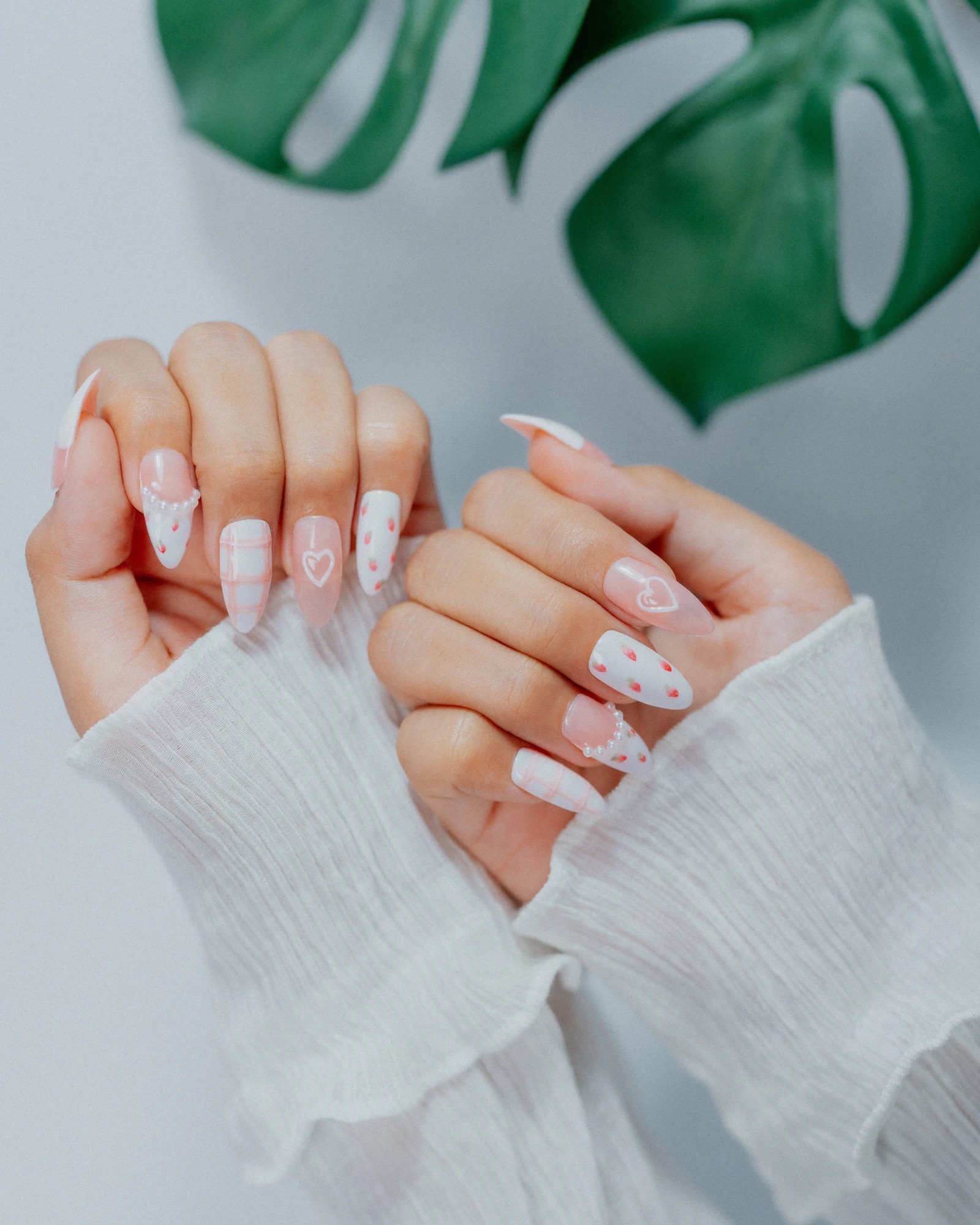 White and pink heart nail design